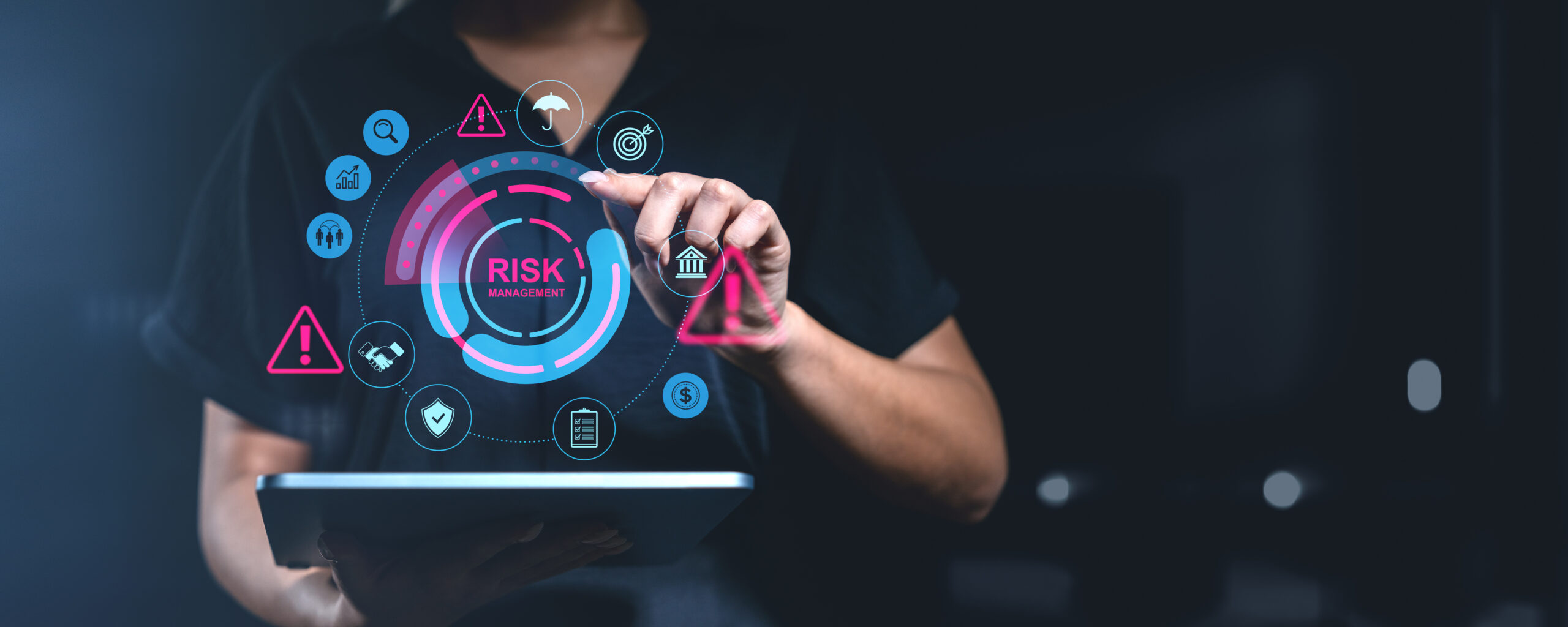 Risk Management Woman in business attire interacting with a digital interface displaying the words "Risk Management".